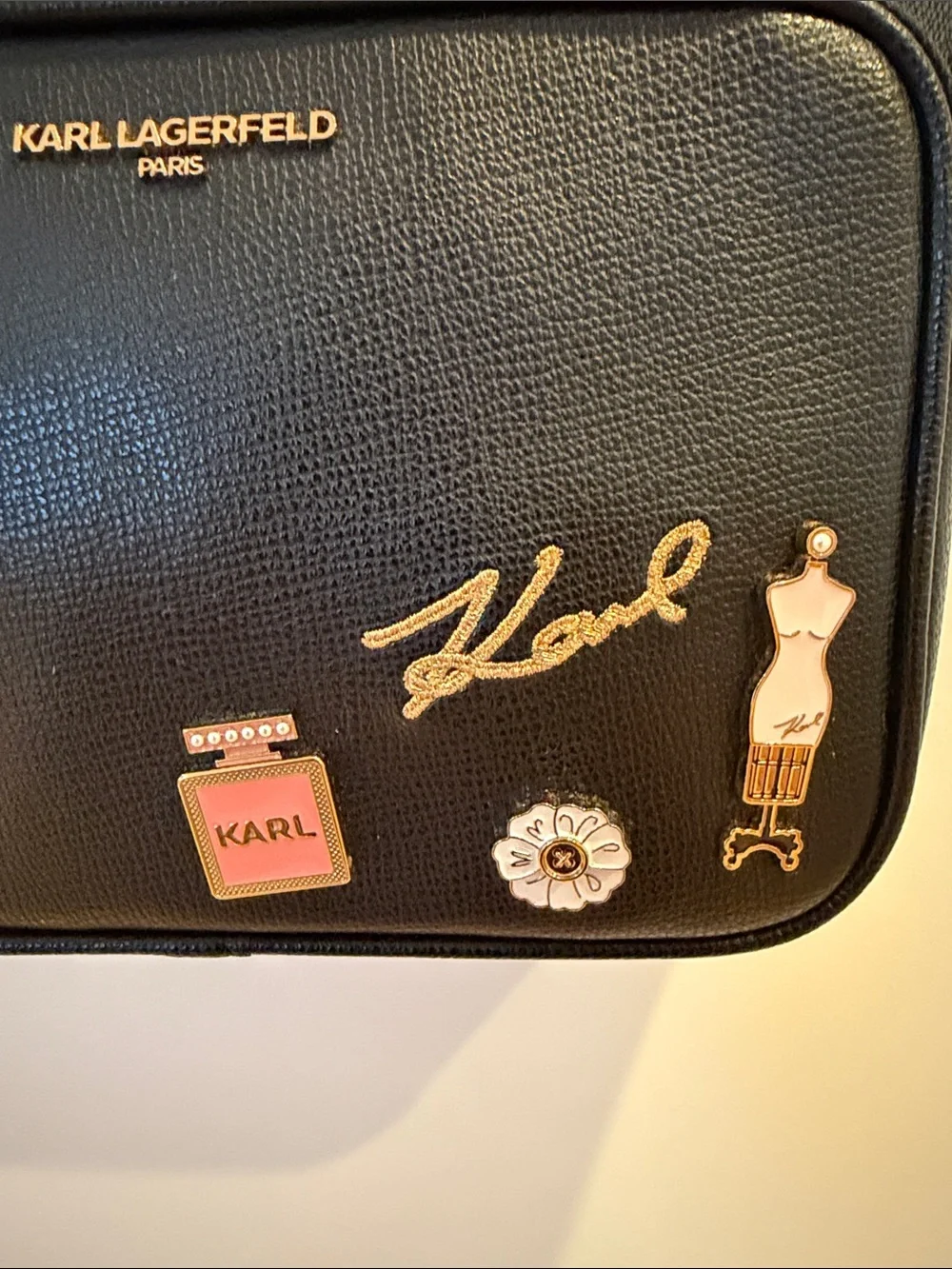 Karl Lagerfeld Black Crossbody Camera Bag with Gold & Pink Charm Accents